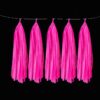 Neon rose pink UV reactive tissue tassels, neon party decoration Auckland NZ