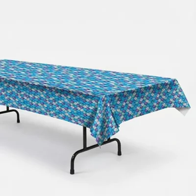 Mermaid scales plastic tablecover 137cm x 274cm draped on a trestle table, blue mermaid under-the-sea party tableware NZ — Balloons4you Silverdale Auckland