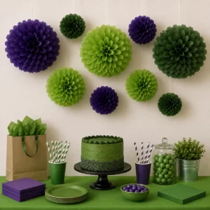 Hanging tissue paper pom poms styled for a Hulk Party display