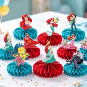 Little Mermaid honeycomb centrepieces on a birthday party table