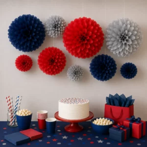 Hanging tissue paper pom poms styled for a Marvel Avengers display