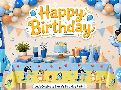 Bluey birthday party table with blue, orange and cream decorations