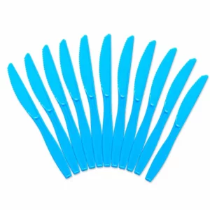 Ten bright blue plastic party knives arranged on a white background