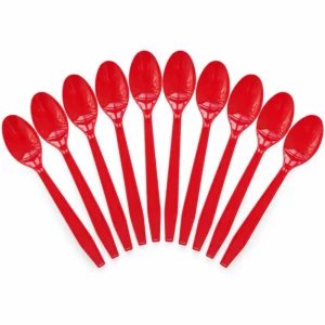 Ten red plastic party spoons arranged on a white background