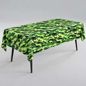 Green and black camouflage tablecloth draped over a rectangular table on a grey background