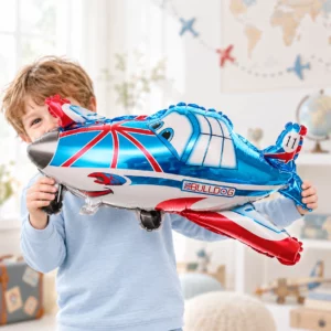 Boy holding Blue Airplane Foil Balloon 80cm against a pale background