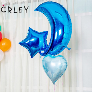 Blue crescent moon and star foil balloons with a pale blue heart balloon
