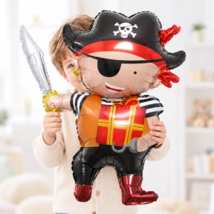 Boy holding Happy Pirate Foil Balloon 60x90cm against a pale background
