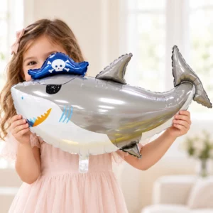 Girl holding Pirate Shark Foil Balloon 97x61cm against a pale background