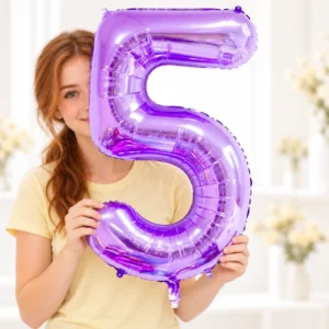 Girl holding Purple Foil Number 5 Balloon 100cm against a pale background