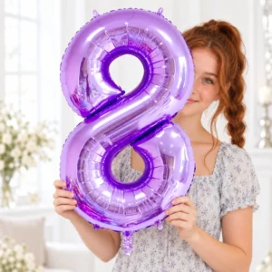 Girl holding Purple Foil Number 8 Balloon 100cm against a pale background