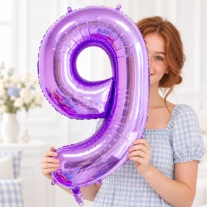 Girl holding Purple Foil Number 9 Balloon 100cm against a pale background