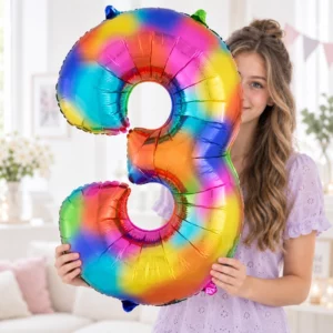 Girl holding Rainbow Foil Number 3 Balloon 100cm against a pale background