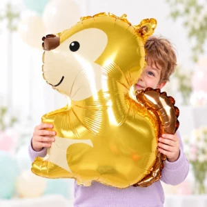 Boy holding Squirrel Forest Animal Foil Balloon 66x47cm against a pale background